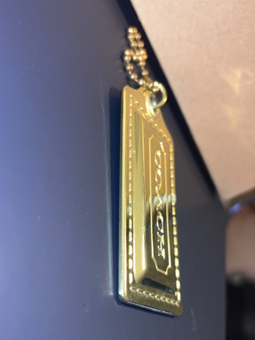 Coach large poppy metallic gold-tone hang tag EUC - Picture 4 of 7